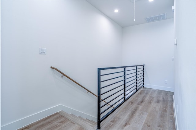 5402 Margarita St, Houston, TX 77020 - stairway with wood finished floors and recessed lighting
