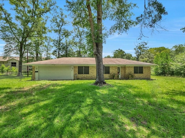 602 Devereaux St, Diboll, TX 75941 - single story home featuring an attached garage and brick siding