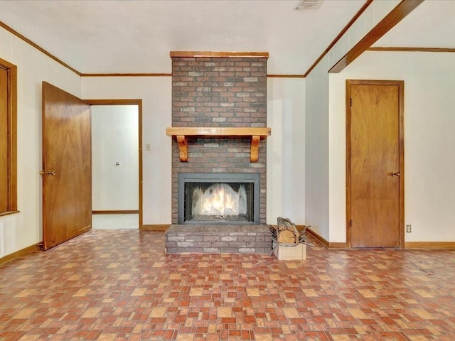 602 Devereaux St, Diboll, TX 75941 - unfurnished living room featuring crown molding and a fireplace