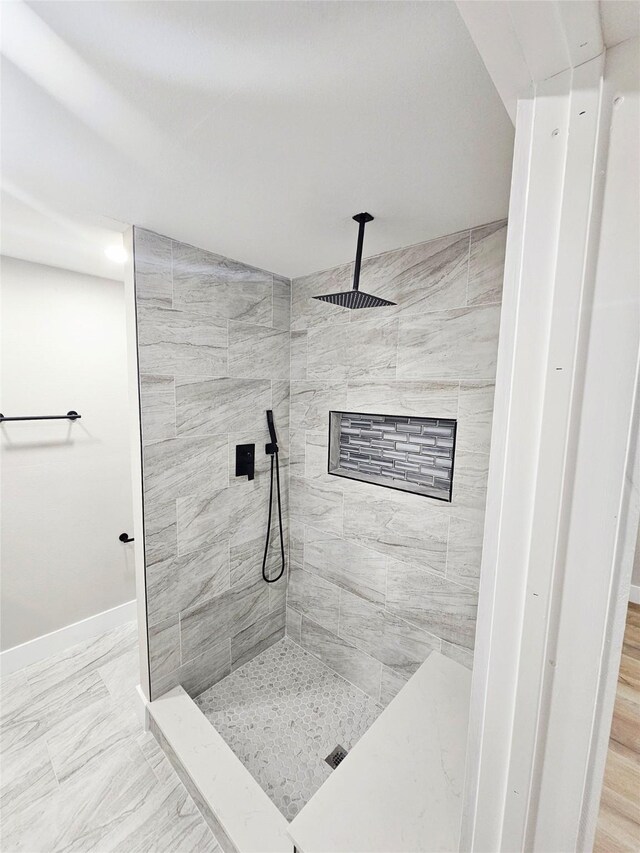 5014 Middleton St, Baytown, TX 77520 - full bathroom with tiled shower and marble finish flooring