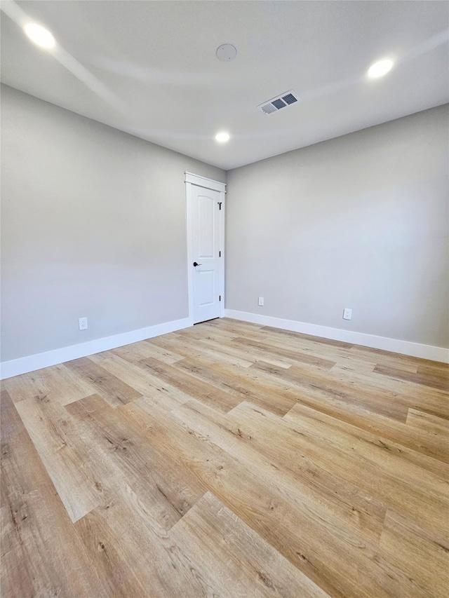 5014 Middleton St, Baytown, TX 77520 - unfurnished room featuring light wood-style flooring and recessed lighting