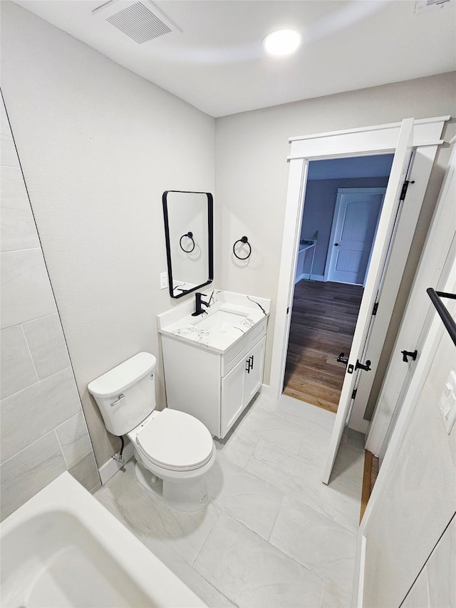 5014 Middleton St, Baytown, TX 77520 - full bath featuring marble look tiles, vanity, a shower, and a tub