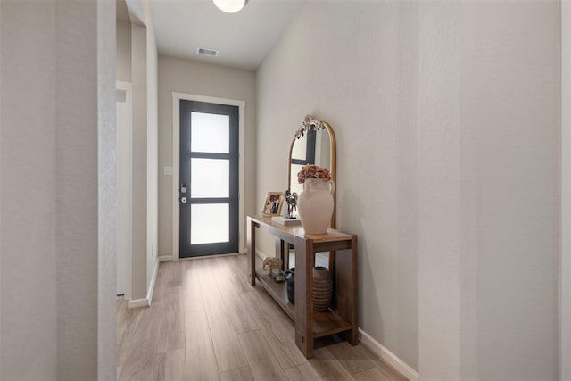 4607 Primrose Valley Ln, Fulshear, TX 77441 - doorway featuring light wood-style flooring