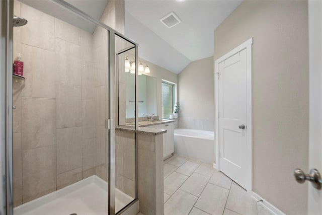 4607 Primrose Valley Ln, Fulshear, TX 77441 - bathroom with a stall shower, a garden tub, vanity, tile patterned floors, and vaulted ceiling