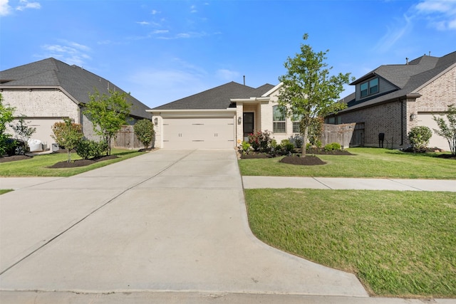 4607 Primrose Valley Ln, Fulshear, TX 77441 - view of front of home featuring concrete driveway and an attached garage