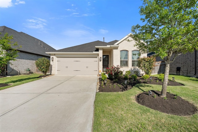 4607 Primrose Valley Ln, Fulshear, TX 77441 - single story home featuring a garage, driveway, brick siding, and a front lawn