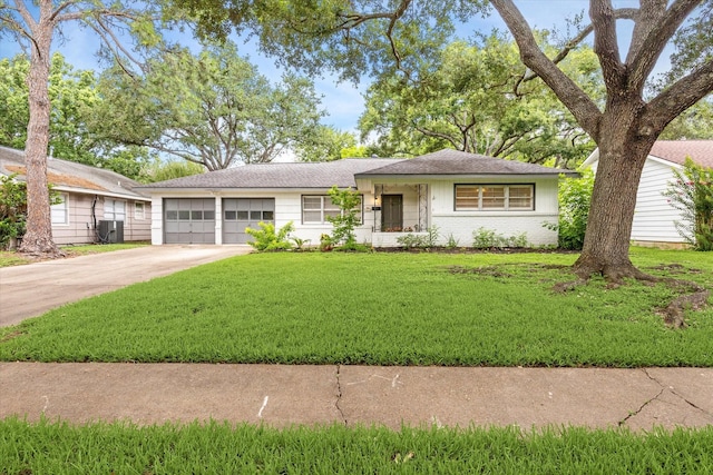 4614 Kinglet St, Houston, TX 77035 - single story home with a garage, concrete driveway, a front lawn, and brick siding