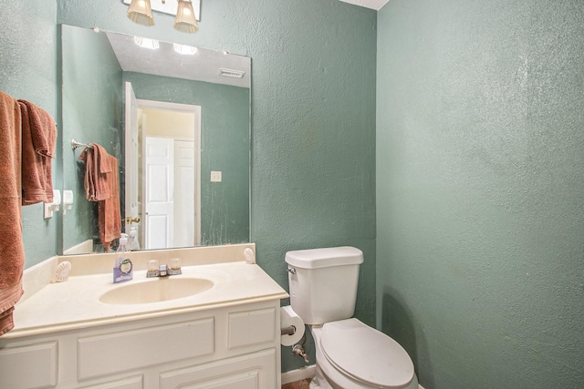 2521 Sea Horse Ct, Seabrook, TX 77586 - bathroom with a textured wall and vanity