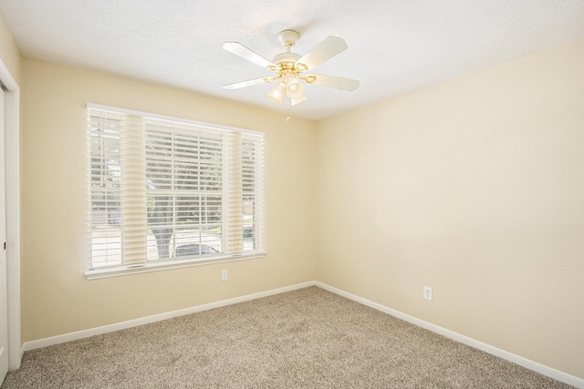2521 Sea Horse Ct, Seabrook, TX 77586 - carpeted spare room featuring baseboards and ceiling fan