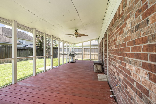 2521 Sea Horse Ct, Seabrook, TX 77586 - wooden terrace featuring grilling area, a fenced backyard, and a ceiling fan