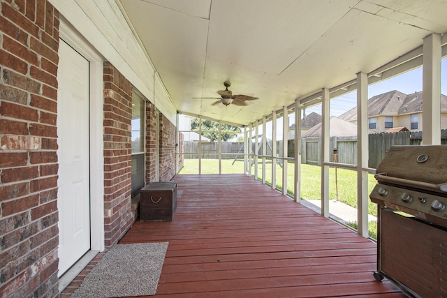2521 Sea Horse Ct, Seabrook, TX 77586 - deck featuring area for grilling, a fenced backyard, and a ceiling fan