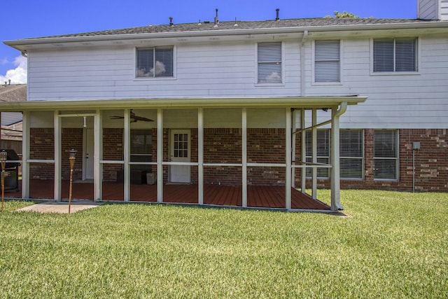 2521 Sea Horse Ct, Seabrook, TX 77586 - back of house with brick siding, a lawn, a sunroom, and a chimney