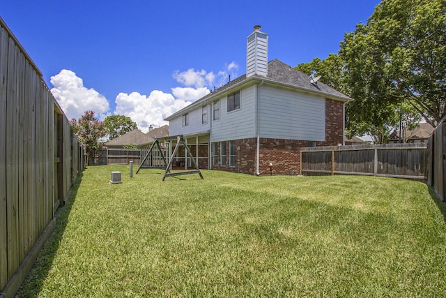2521 Sea Horse Ct, Seabrook, TX 77586 - fenced backyard with a playground