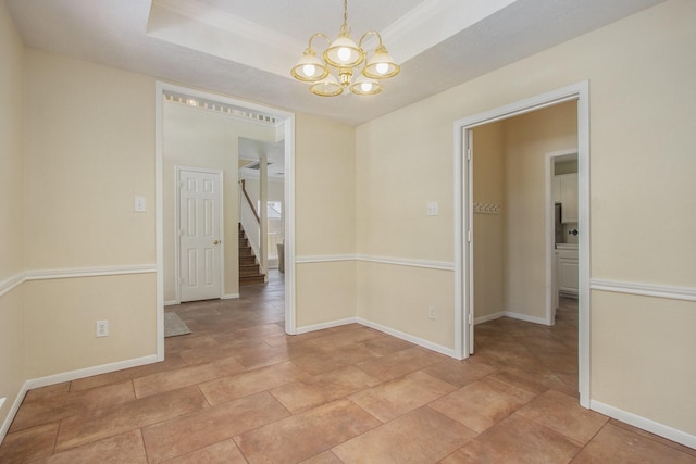 2521 Sea Horse Ct, Seabrook, TX 77586 - unfurnished room with a chandelier, stairway, and a tray ceiling