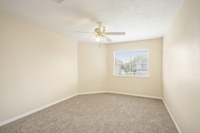 2521 Sea Horse Ct, Seabrook, TX 77586 - empty room with carpet floors, a ceiling fan, and a textured ceiling