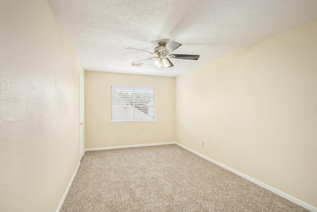 2521 Sea Horse Ct, Seabrook, TX 77586 - spare room featuring ceiling fan, light colored carpet, and a textured ceiling