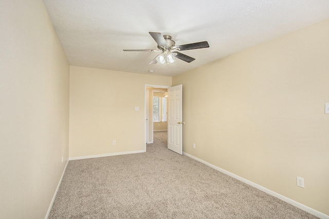 2521 Sea Horse Ct, Seabrook, TX 77586 - empty room with ceiling fan and carpet flooring