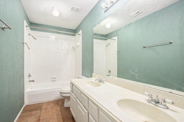 2521 Sea Horse Ct, Seabrook, TX 77586 - full bath with tub / shower combination, double vanity, a textured wall, and tile patterned floors