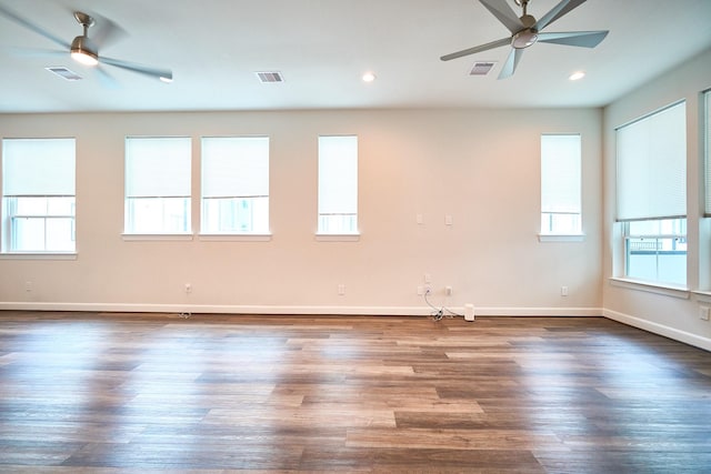 2802 Grand Fountains Dr Unit C, Houston, TX 77054 - empty room featuring a ceiling fan, wood finished floors, and recessed lighting