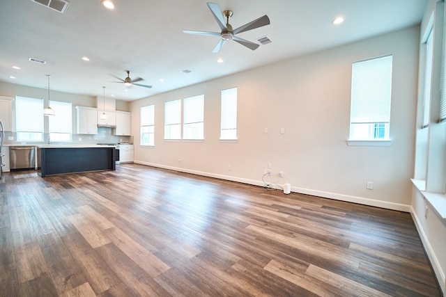2802 Grand Fountains Dr Unit C, Houston, TX 77054 - unfurnished living room featuring a ceiling fan, recessed lighting, and dark wood finished floors