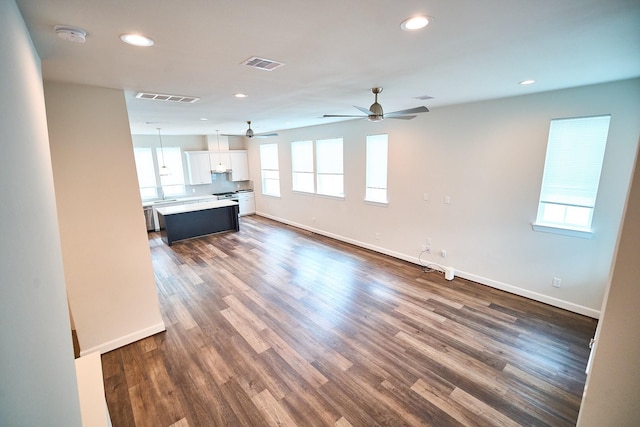 2802 Grand Fountains Dr Unit C, Houston, TX 77054 - unfurnished living room with recessed lighting, ceiling fan, and dark wood-style flooring