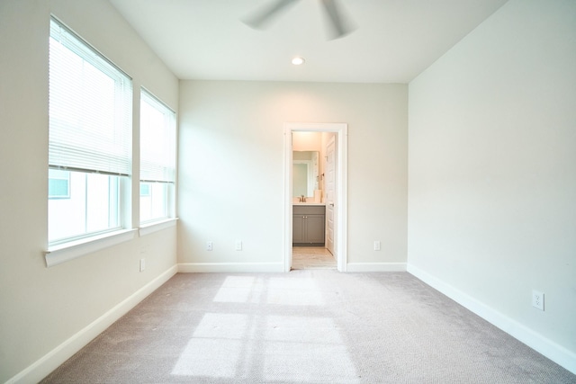 2802 Grand Fountains Dr Unit C, Houston, TX 77054 - unfurnished bedroom with light carpet, ensuite bathroom, recessed lighting, and ceiling fan