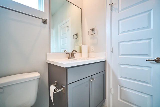 2802 Grand Fountains Dr Unit C, Houston, TX 77054 - half bathroom featuring vanity and toilet