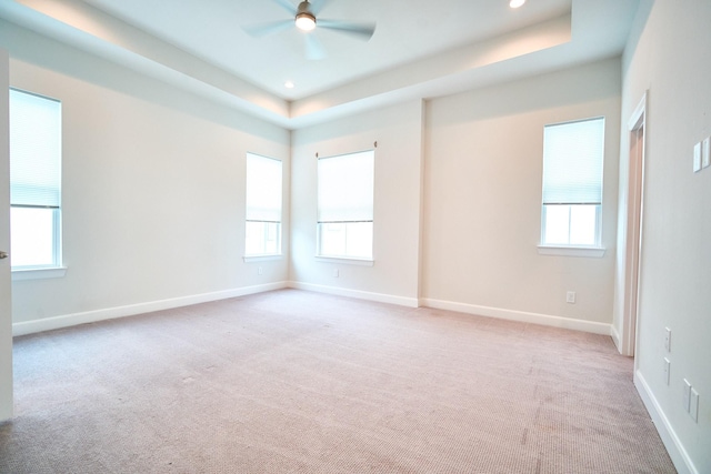 2802 Grand Fountains Dr Unit C, Houston, TX 77054 - unfurnished room featuring ceiling fan, light carpet, plenty of natural light, a raised ceiling, and recessed lighting