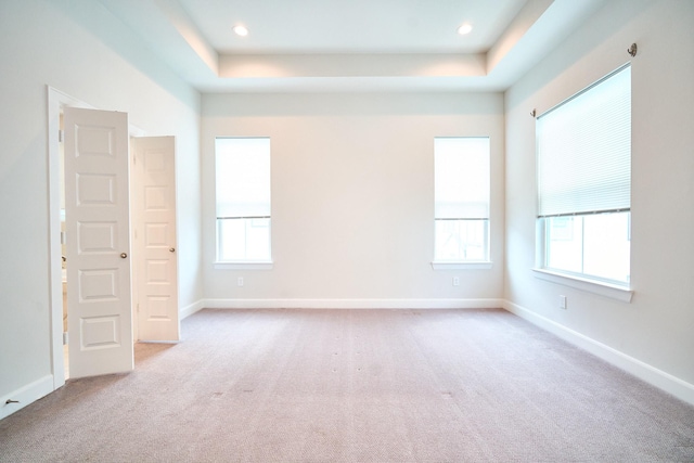 2802 Grand Fountains Dr Unit C, Houston, TX 77054 - carpeted empty room featuring healthy amount of natural light, a tray ceiling, and recessed lighting