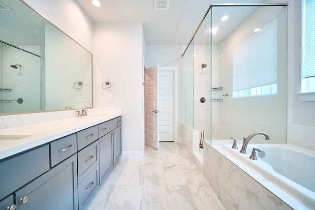 2802 Grand Fountains Dr Unit C, Houston, TX 77054 - bathroom with a shower stall, a garden tub, double vanity, marble look tile flooring, and recessed lighting