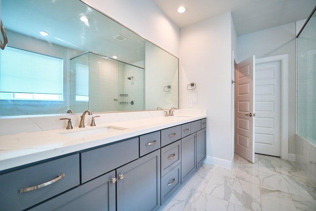 2802 Grand Fountains Dr Unit C, Houston, TX 77054 - bathroom featuring double vanity, a tile shower, marble finish flooring, and recessed lighting