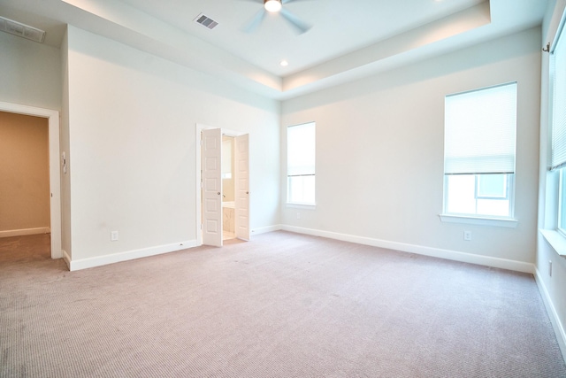 2802 Grand Fountains Dr Unit C, Houston, TX 77054 - unfurnished room featuring light colored carpet, a ceiling fan, a tray ceiling, and recessed lighting