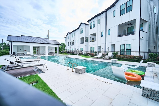 2802 Grand Fountains Dr Unit C, Houston, TX 77054 - community pool with a patio and a ceiling fan