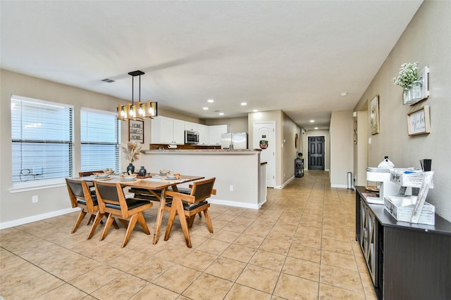 10515 Kentington Oak Dr, Humble, TX 77396 - dining space featuring light tile patterned flooring and recessed lighting