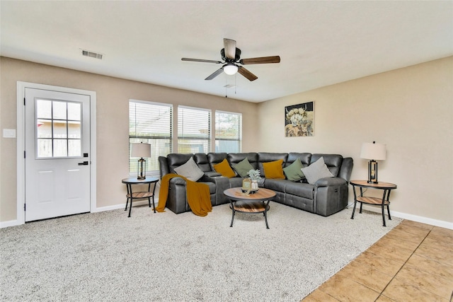 10515 Kentington Oak Dr, Humble, TX 77396 - living room with ceiling fan, carpet floors, and tile patterned floors