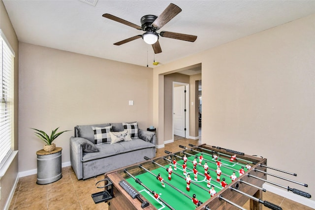 10515 Kentington Oak Dr, Humble, TX 77396 - rec room with a ceiling fan and tile patterned flooring