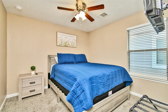 10515 Kentington Oak Dr, Humble, TX 77396 - bedroom featuring light carpet and ceiling fan