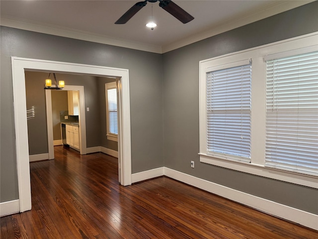 110 E 24th St, Houston, TX 77008 - unfurnished room with dark wood-type flooring, a chandelier, ornamental molding, and ceiling fan