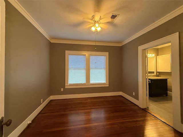 110 E 24th St, Houston, TX 77008 - unfurnished room featuring ornamental molding, dark wood-style floors, and ceiling fan