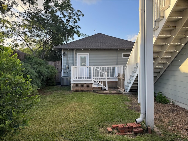 110 E 24th St, Houston, TX 77008 - back of property featuring stairway and a shingled roof