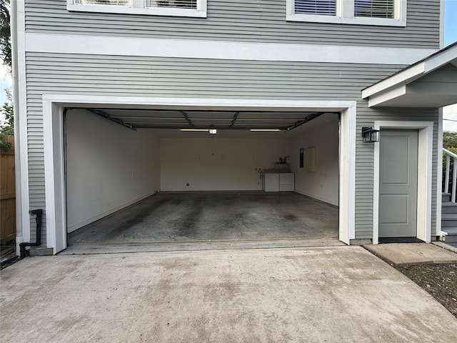 110 E 24th St, Houston, TX 77008 - garage featuring concrete driveway