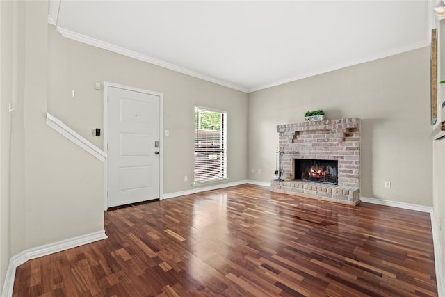 2425 Augusta Dr Unit 30, Houston, TX 77057 - unfurnished living room with wood finished floors, a fireplace, and crown molding