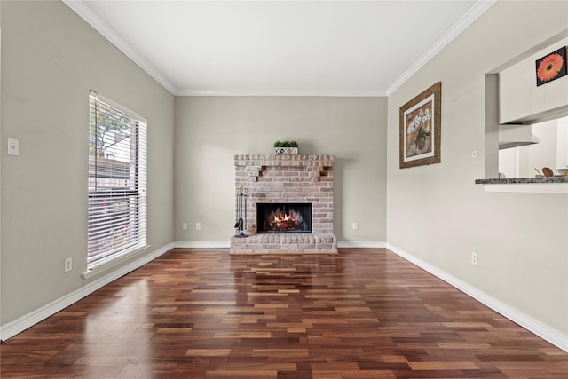 2425 Augusta Dr Unit 30, Houston, TX 77057 - unfurnished living room featuring ornamental molding, dark wood finished floors, and a fireplace