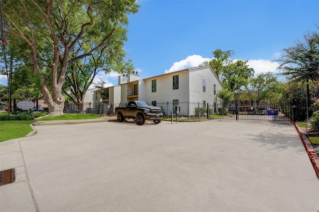 2425 Augusta Dr Unit 30, Houston, TX 77057 - exterior space featuring uncovered parking and a gate