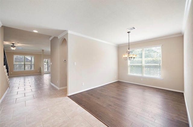 2 Painted Post Pl, Spring, TX 77389 - spare room with crown molding, ceiling fan, a chandelier, recessed lighting, and arched walkways