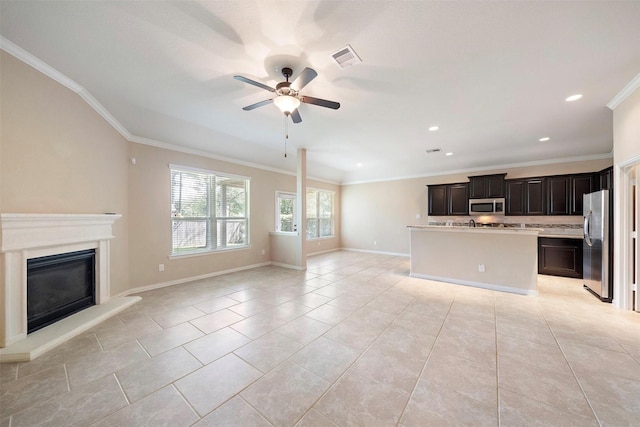 2 Painted Post Pl, Spring, TX 77389 - unfurnished living room featuring crown molding, ceiling fan, a glass covered fireplace, light tile patterned flooring, and recessed lighting