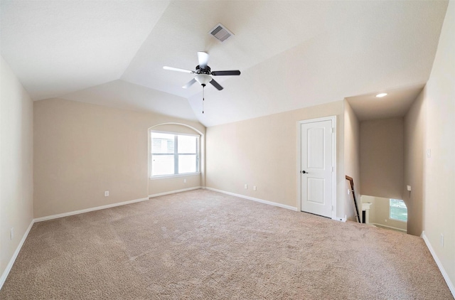 2 Painted Post Pl, Spring, TX 77389 - unfurnished room with light colored carpet, lofted ceiling, and a ceiling fan