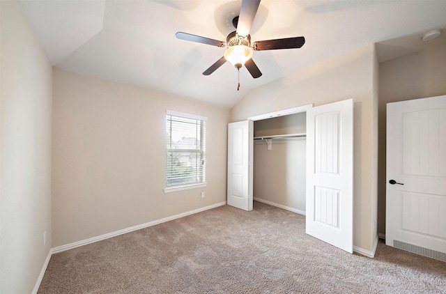 2 Painted Post Pl, Spring, TX 77389 - unfurnished bedroom featuring light carpet, vaulted ceiling, a closet, and ceiling fan