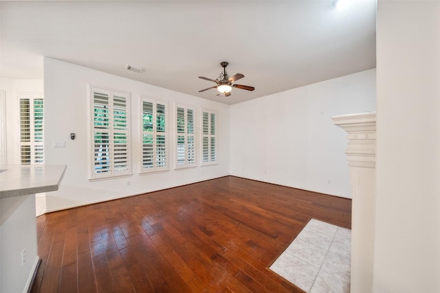 47 Dresden Pl, The Woodlands, TX 77382 - unfurnished living room with ceiling fan and hardwood / wood-style floors