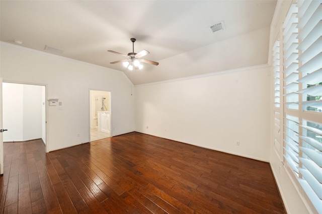 47 Dresden Pl, The Woodlands, TX 77382 - empty room featuring a ceiling fan, crown molding, dark wood-style flooring, vaulted ceiling, and plenty of natural light
